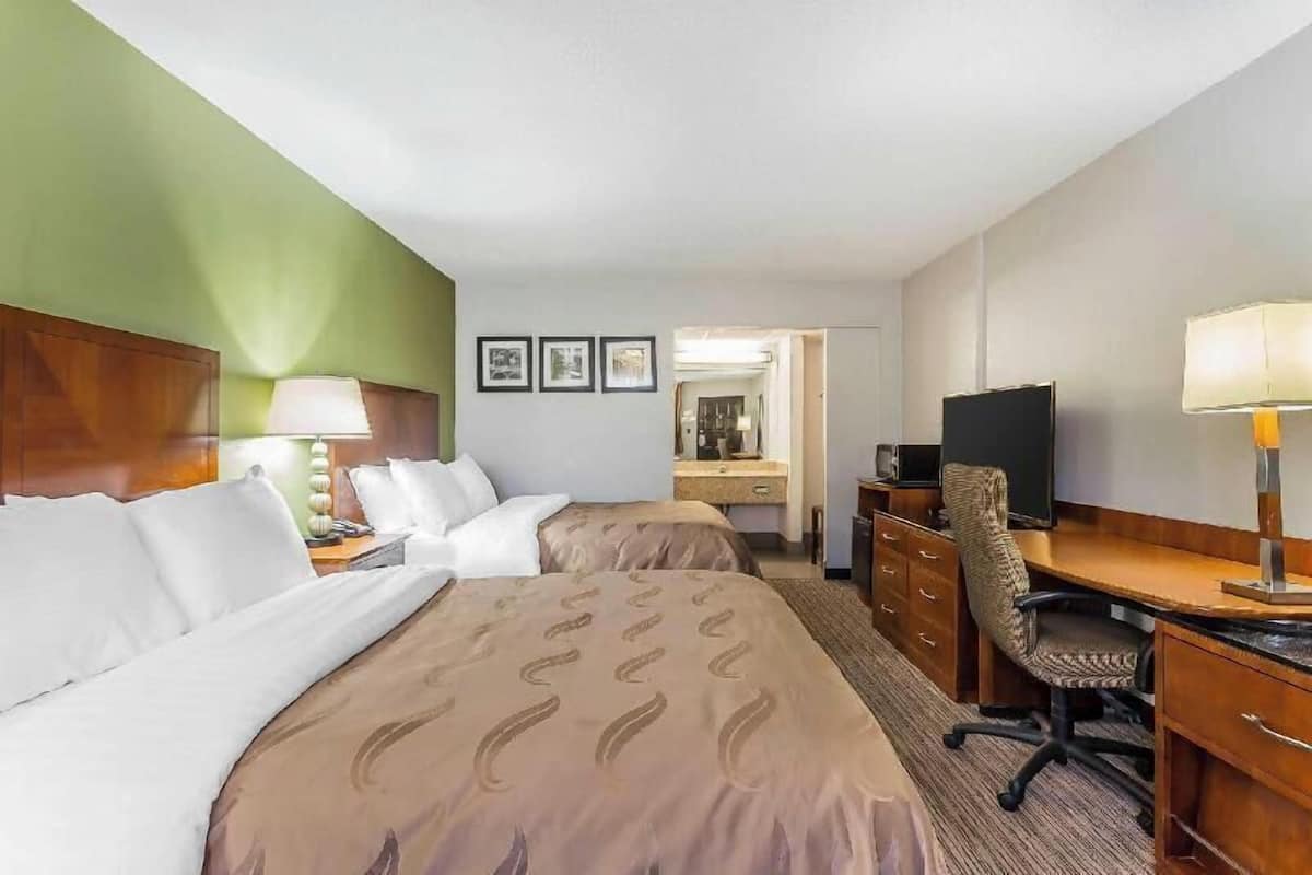 Desk, laptop workspace, blackout drapes, soundproofing