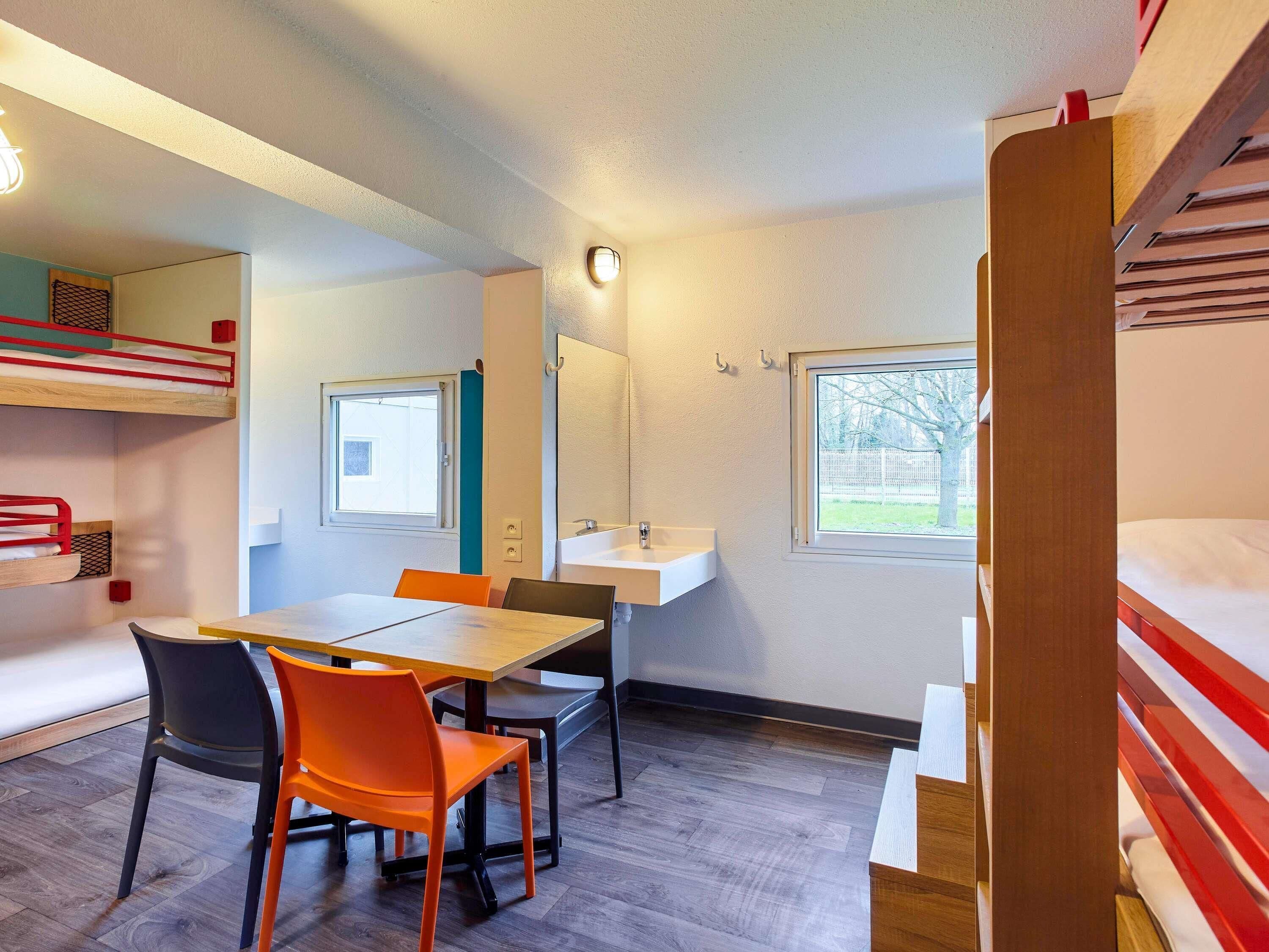 Desk, blackout drapes, soundproofing, free cribs/infant beds
