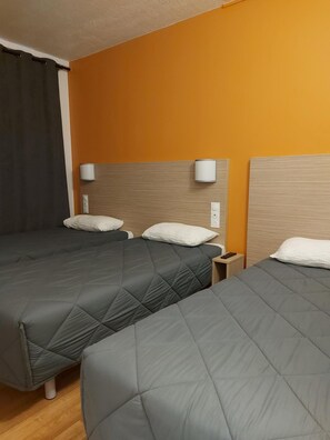 Desk, blackout drapes, soundproofing, free WiFi