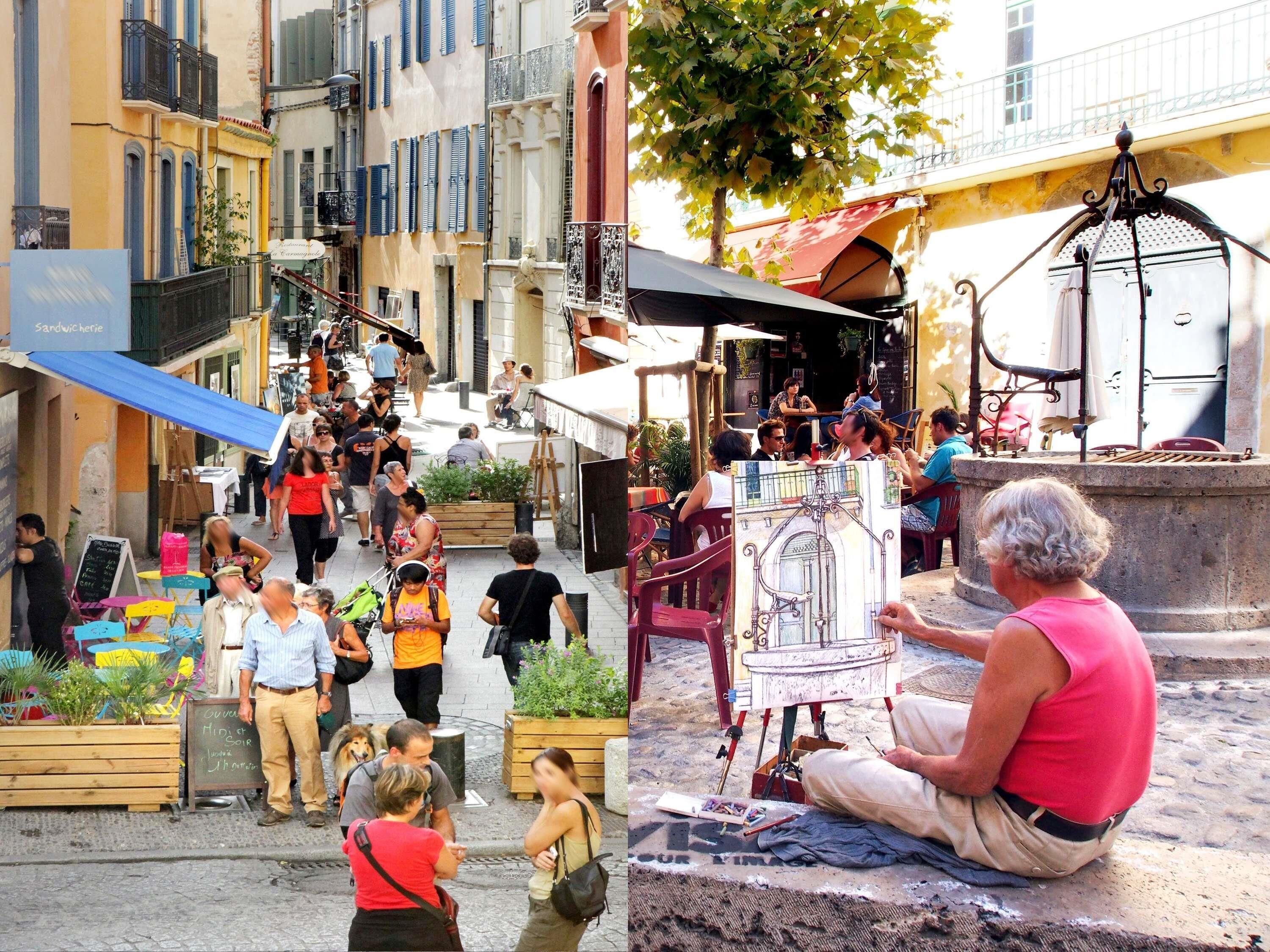A bustling street scene with people, outdoor seating, and a street artist painting.