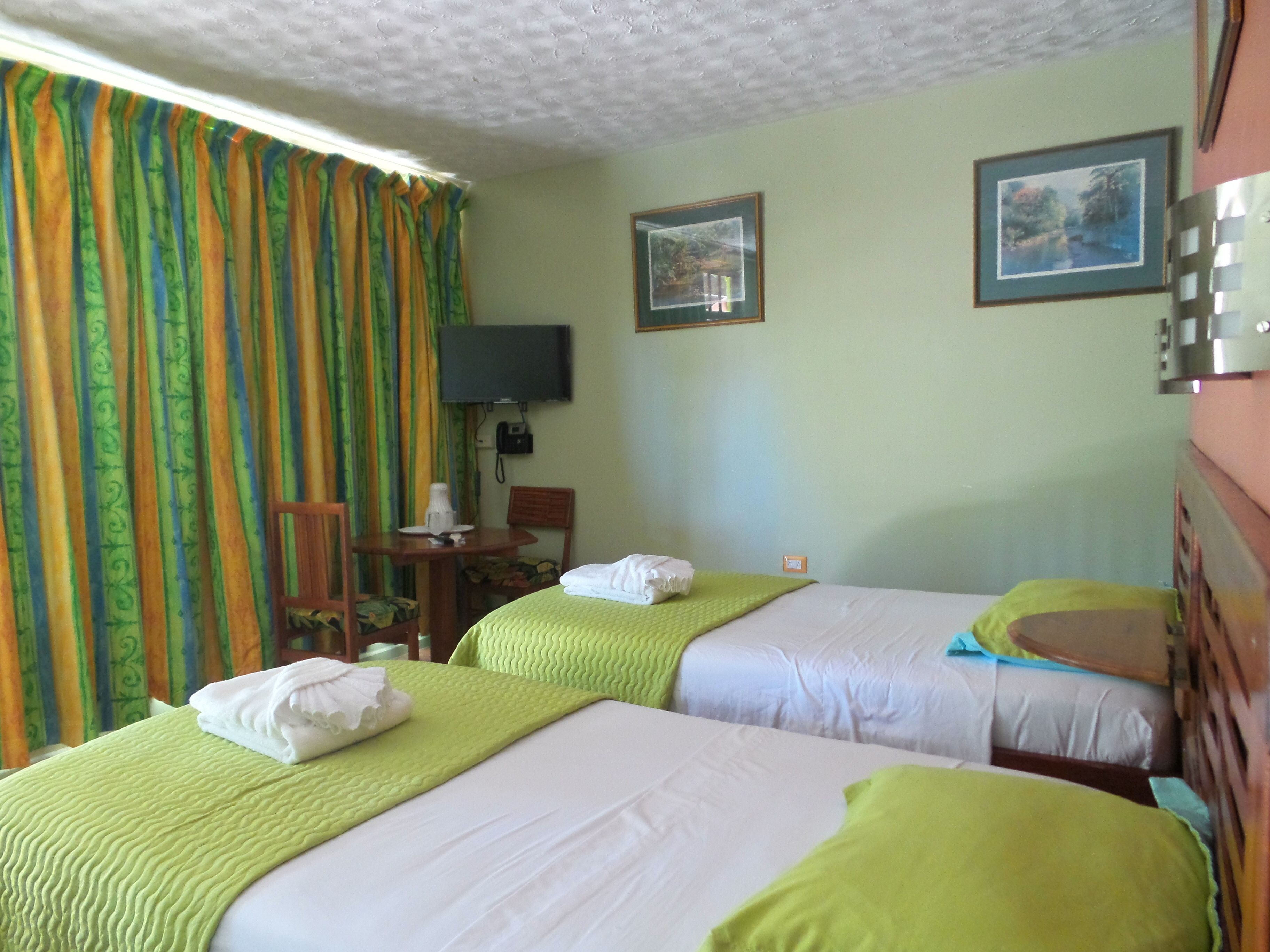 superior room, garden area | in-room safe, desk, laptop workspace, blackout curtains