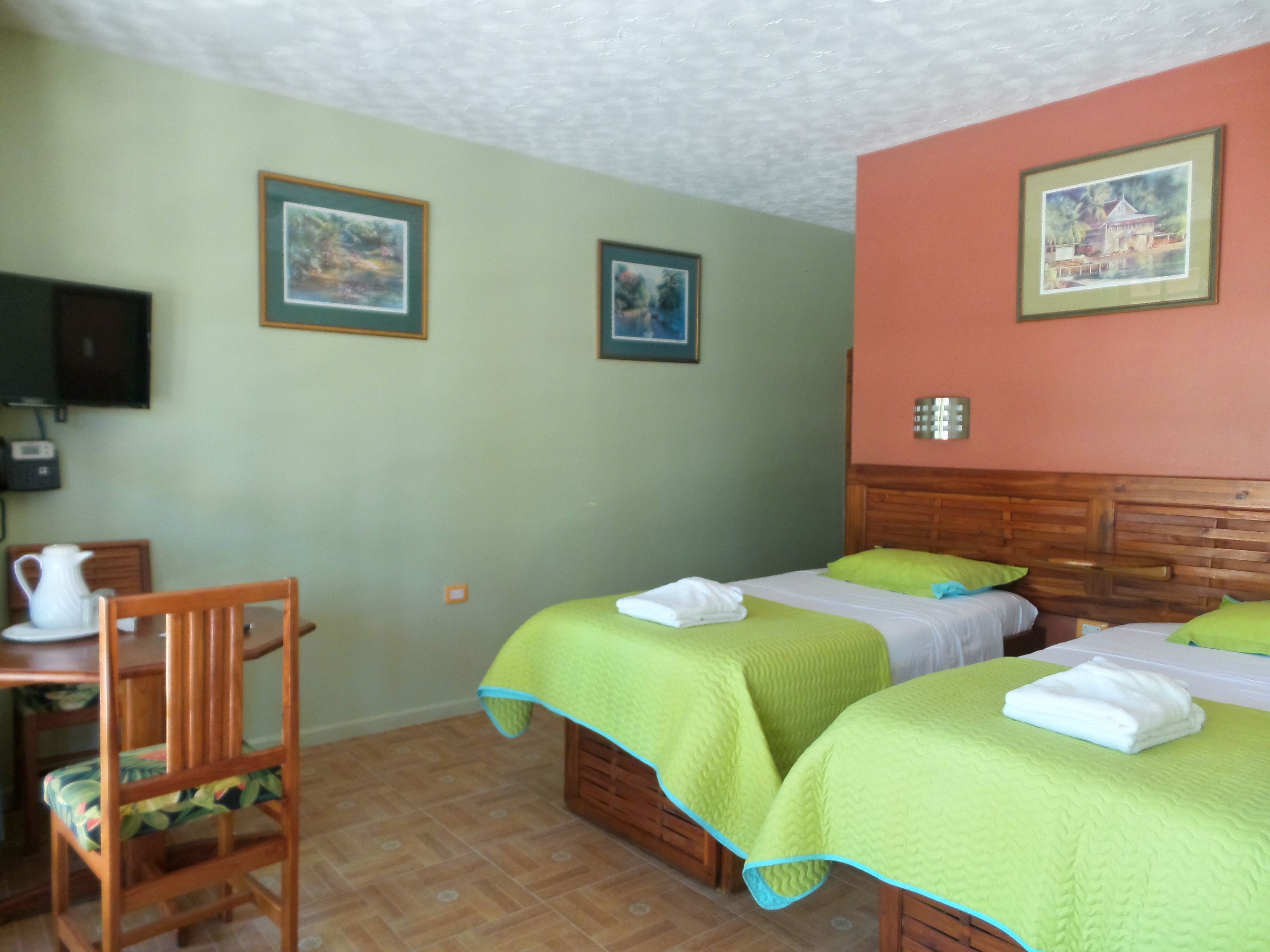 superior room, garden area | in-room safe, desk, laptop workspace, blackout curtains