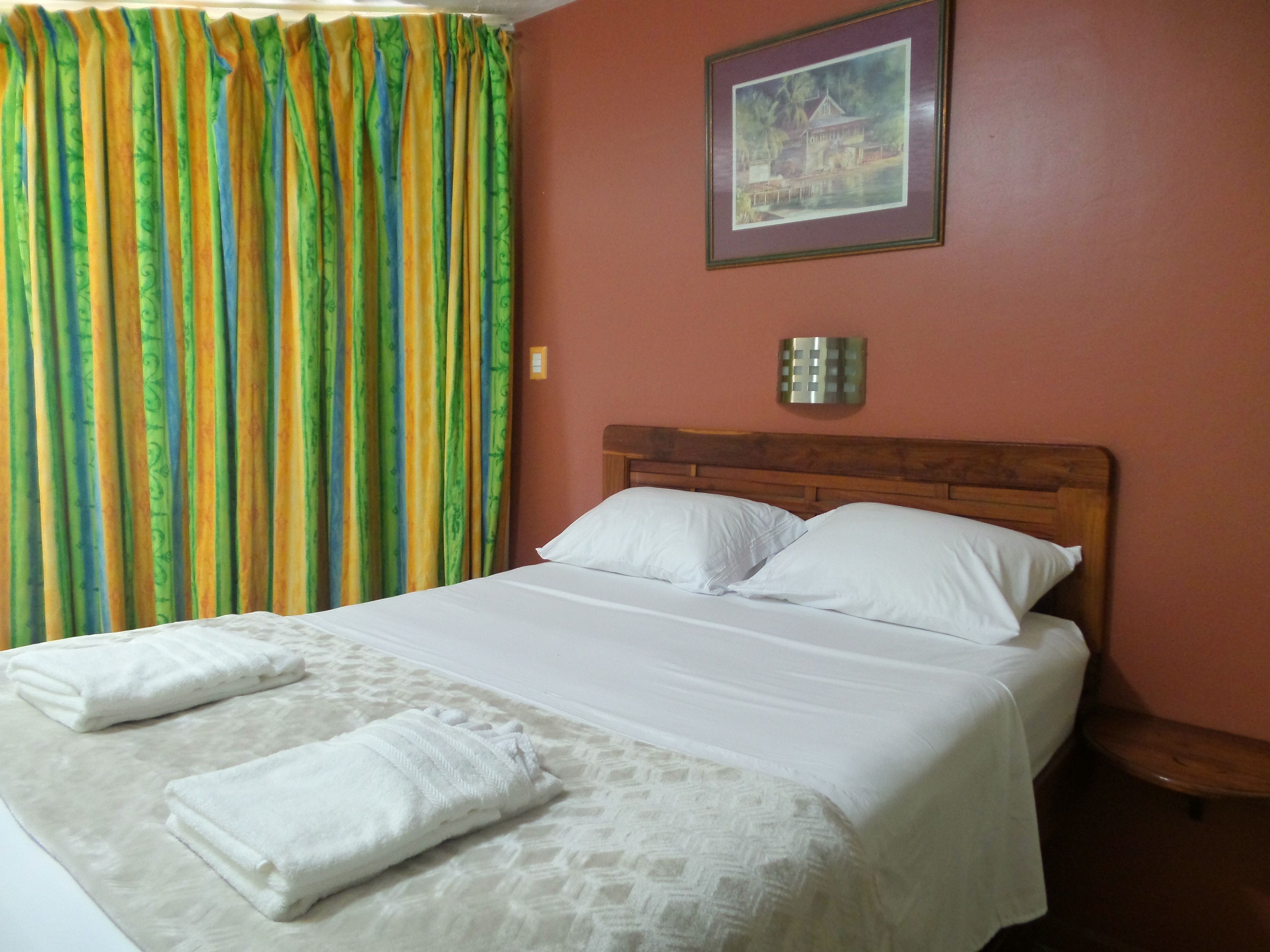 superior room, garden area | in-room safe, desk, laptop workspace, blackout curtains