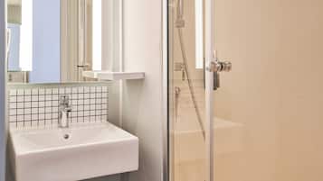 Shower, eco-friendly toiletries, hair dryer, towels