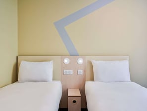 Chambre Standard, 2 lits une place | Bureau, chambres insonorisées, lits bébé (gratuits), Wi-Fi gratuit