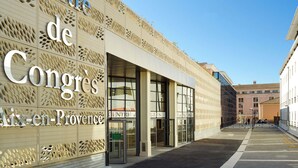 A building with a facade featuring a geometric pattern and the text 'Centre de Congres Aix-en-Provence.' - hotelF1 Aix en Provence Sainte Victoire Hotel (Meyreuil)