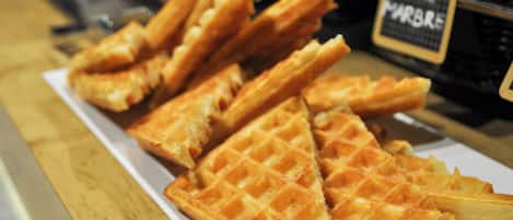 A plate of freshly made waffles.