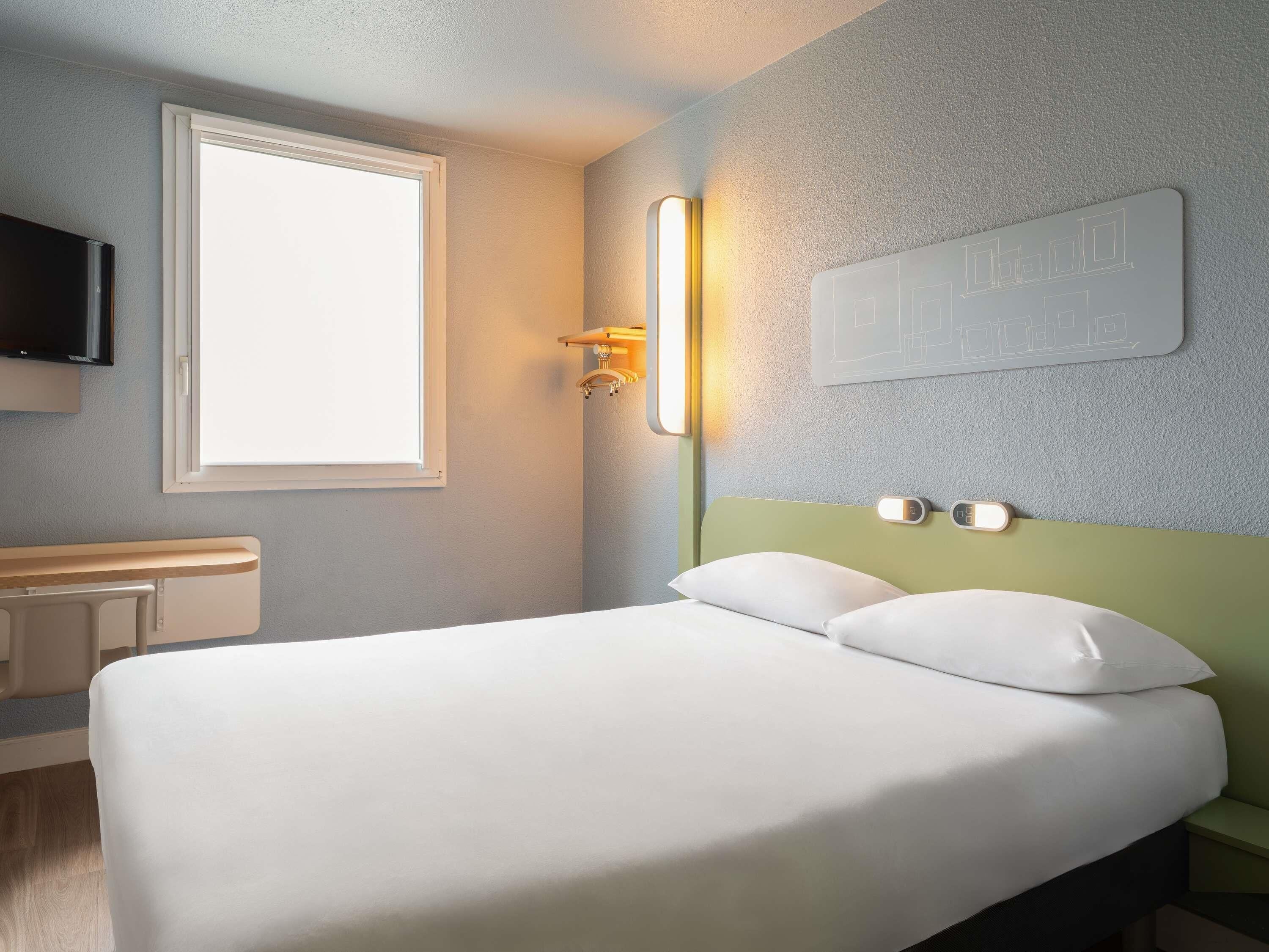 Habitación doble | Escritorio, wifi gratis y ropa de cama 