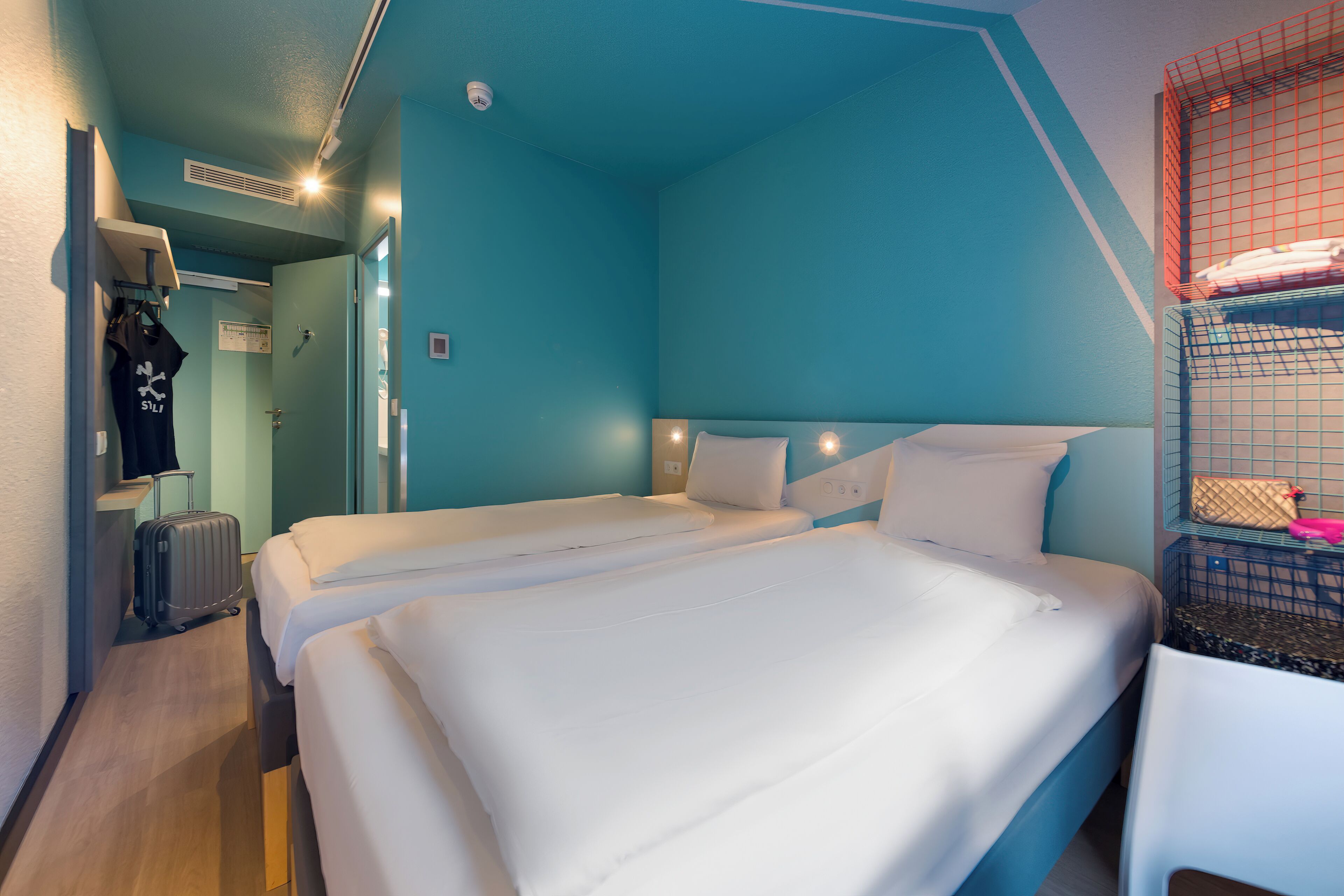 Desk, laptop workspace, free WiFi, bed sheets