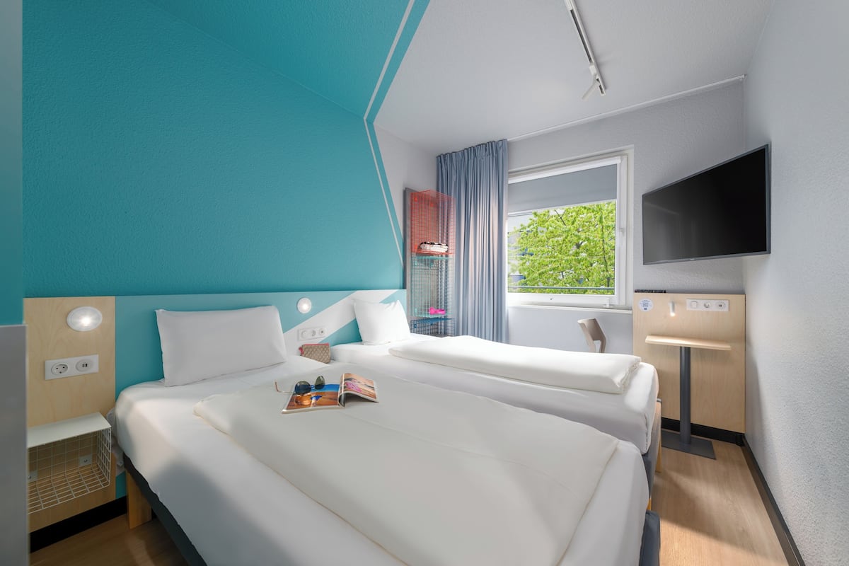 Desk, laptop workspace, free WiFi, bed sheets