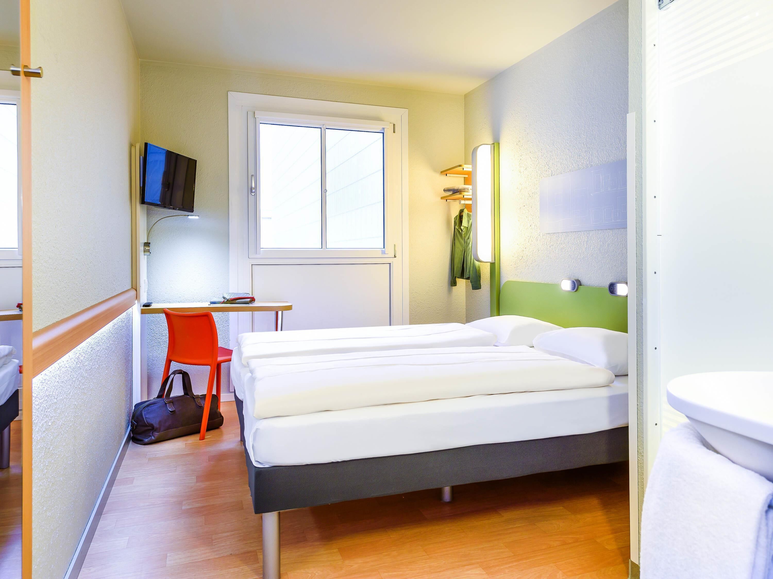 Desk, laptop workspace, free WiFi, bed sheets