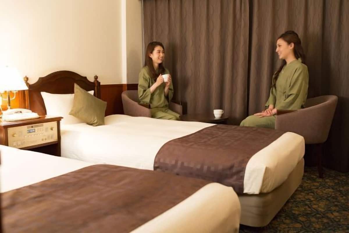 Premium bedding, down duvets, in-room safe, desk
