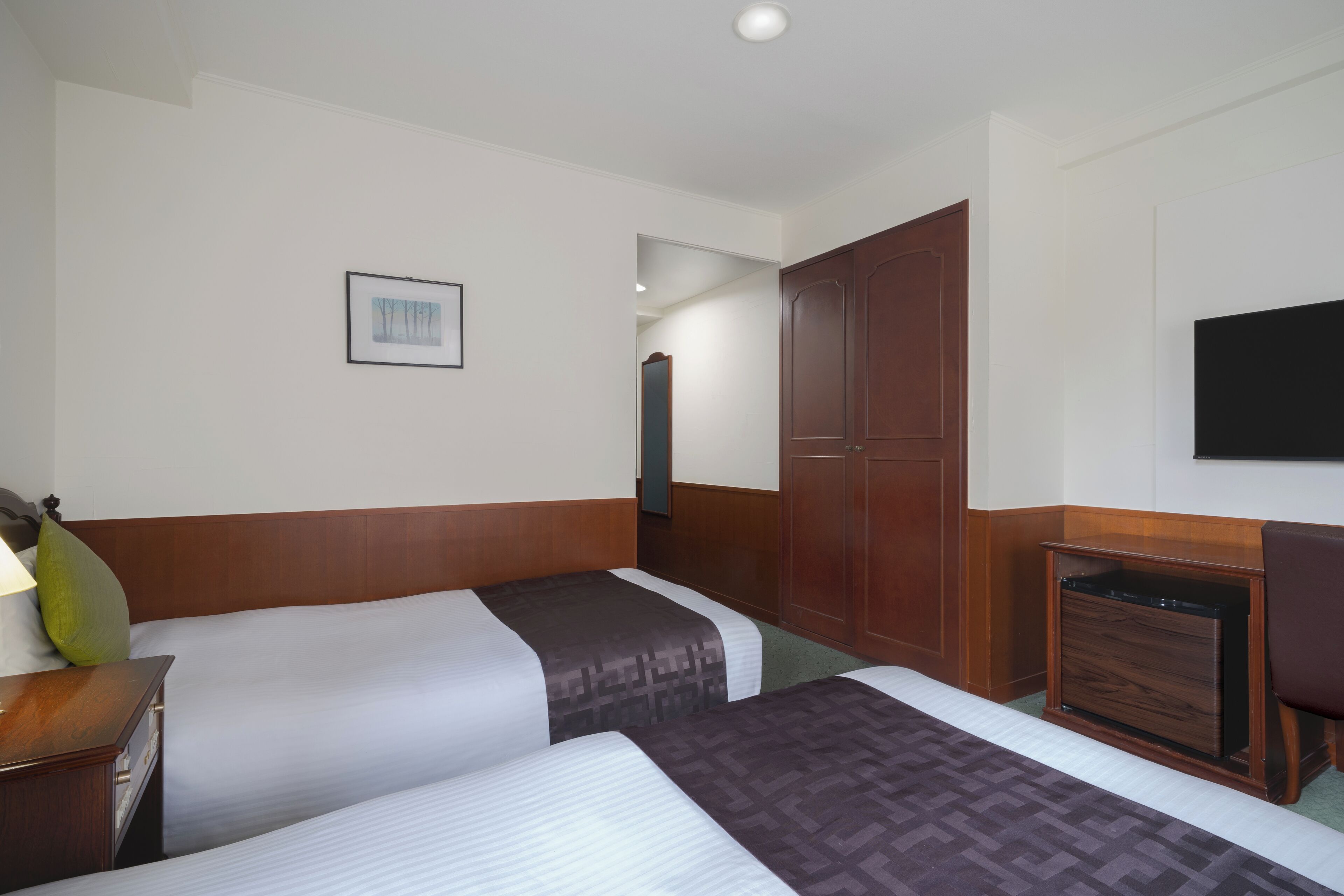 Premium bedding, down duvets, in-room safe, desk