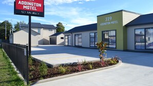 A motel with a sign indicating it is number 319, named Addington Motel, and has no vacancies. - 319 Addington Motel (Christchurch)