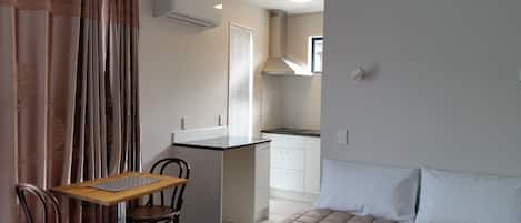 Studio (Queen Studio with Bath (3 Adults))