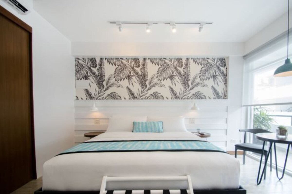 Premium bedding, down comforters, pillowtop beds, minibar