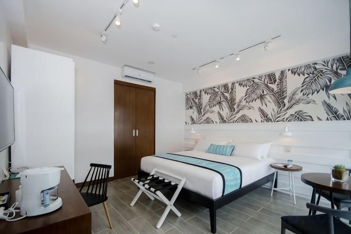 Premium bedding, down comforters, pillowtop beds, minibar