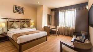 Ropa de cama de alta calidad y minibar 