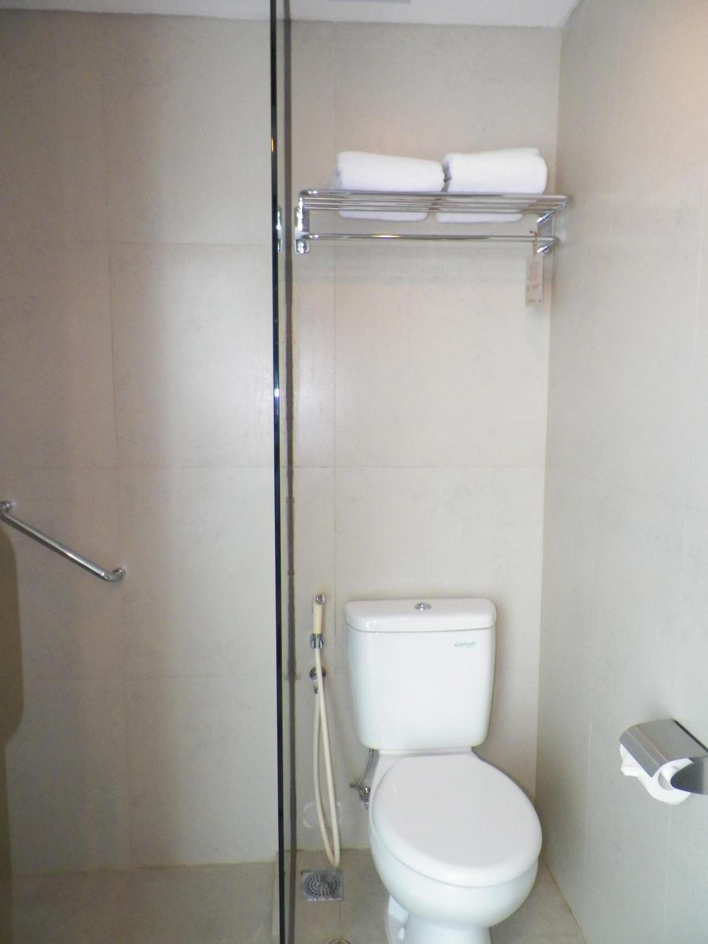 shower, free toiletries, slippers, towels