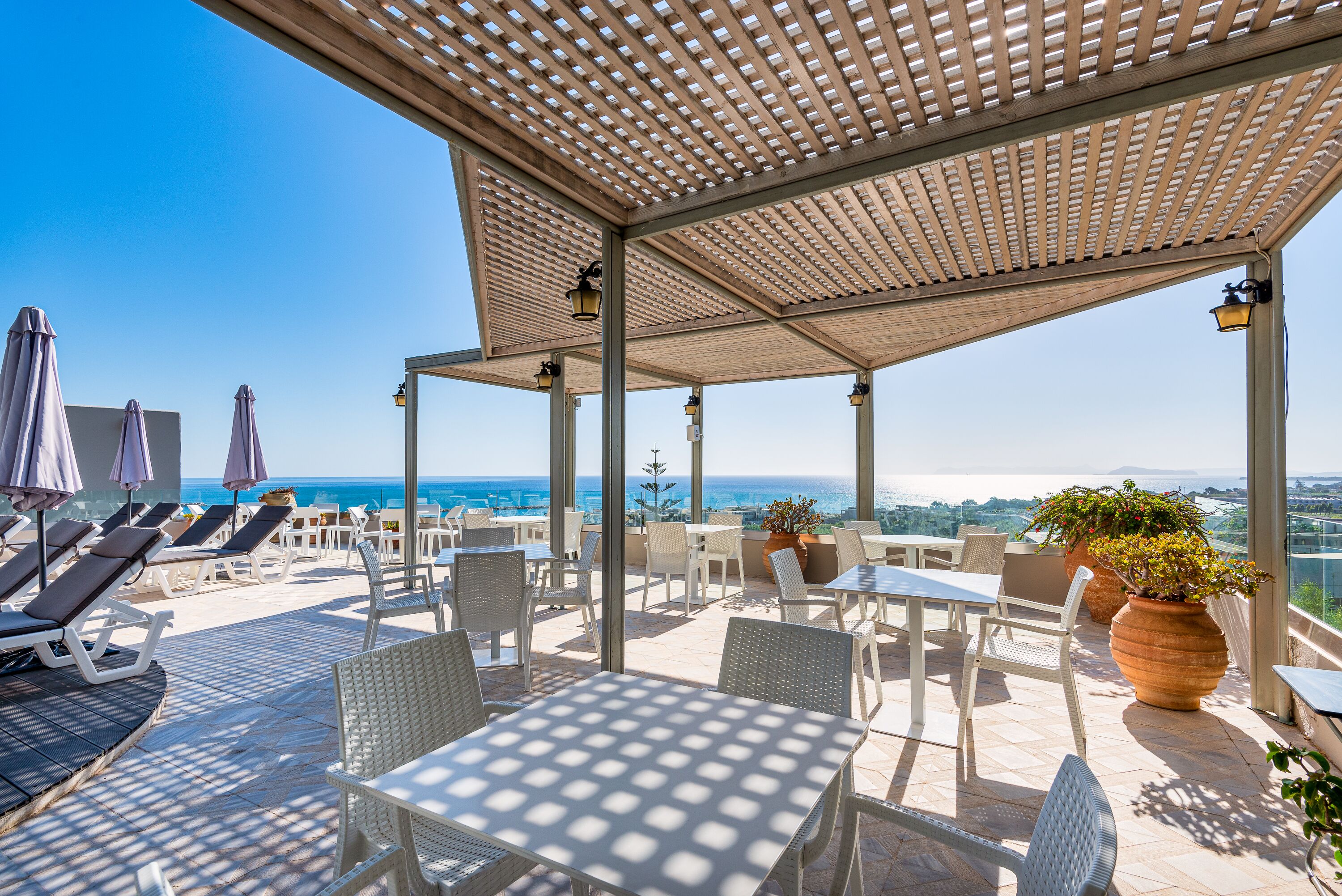 seasonal outdoor pool, open 10:00 am to 6:00 pm, pool umbrellas