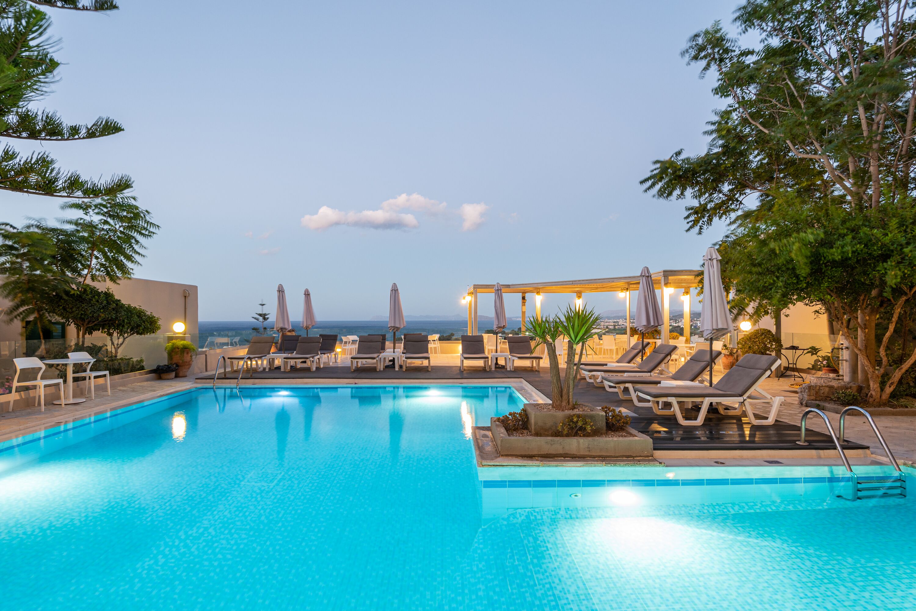 seasonal outdoor pool, open 10:00 am to 6:00 pm, pool umbrellas