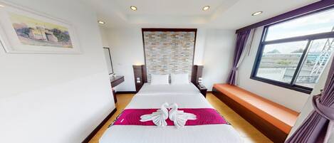 Deluxe Room | Een minibar, een bureau, extra bedden, gratis wifi