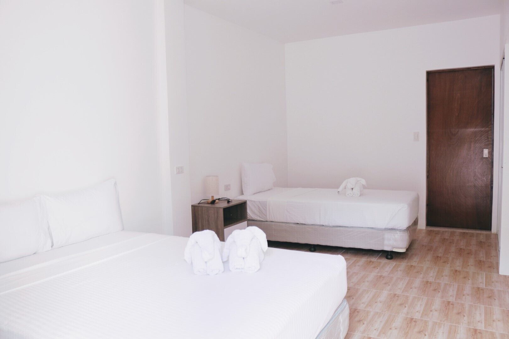 triple room, patio, garden view | desk, laptop workspace, free wifi, bed sheets