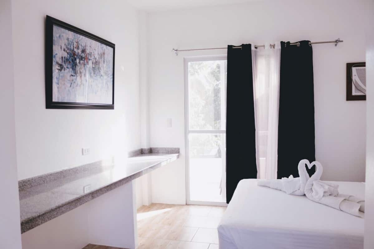 Chambre Triple, patio, vue jardin