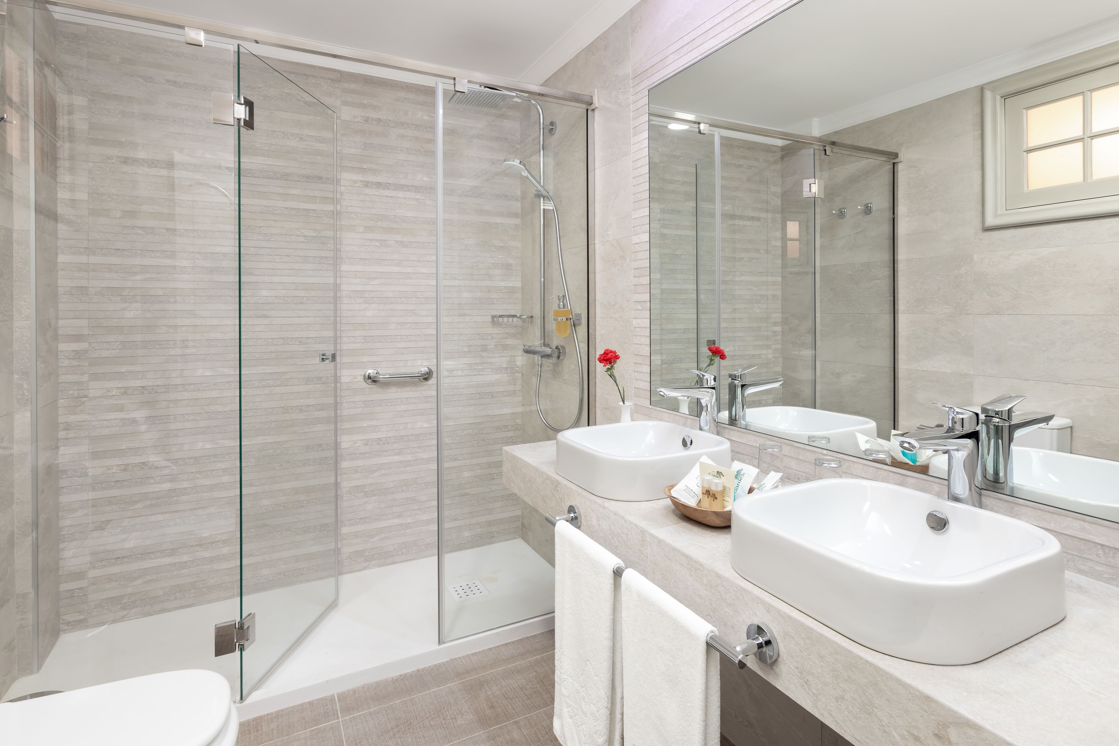 combined shower/bathtub, free toiletries, hair dryer, bathrobes