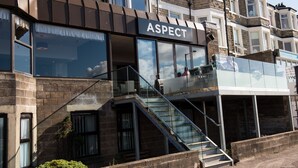 A building with a sign reading "ASPECT" on the facade. - Lothersdale Hotel Morecambe by Belvilla (Morecambe)