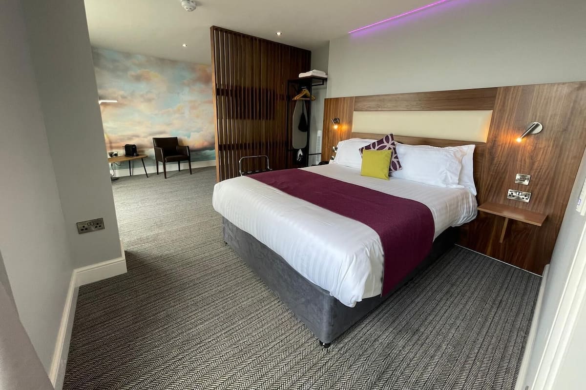 Suite, 1 King Bed, Non Smoking (with Sofabed) | In-room safe, desk, laptop workspace, iron/ironing board