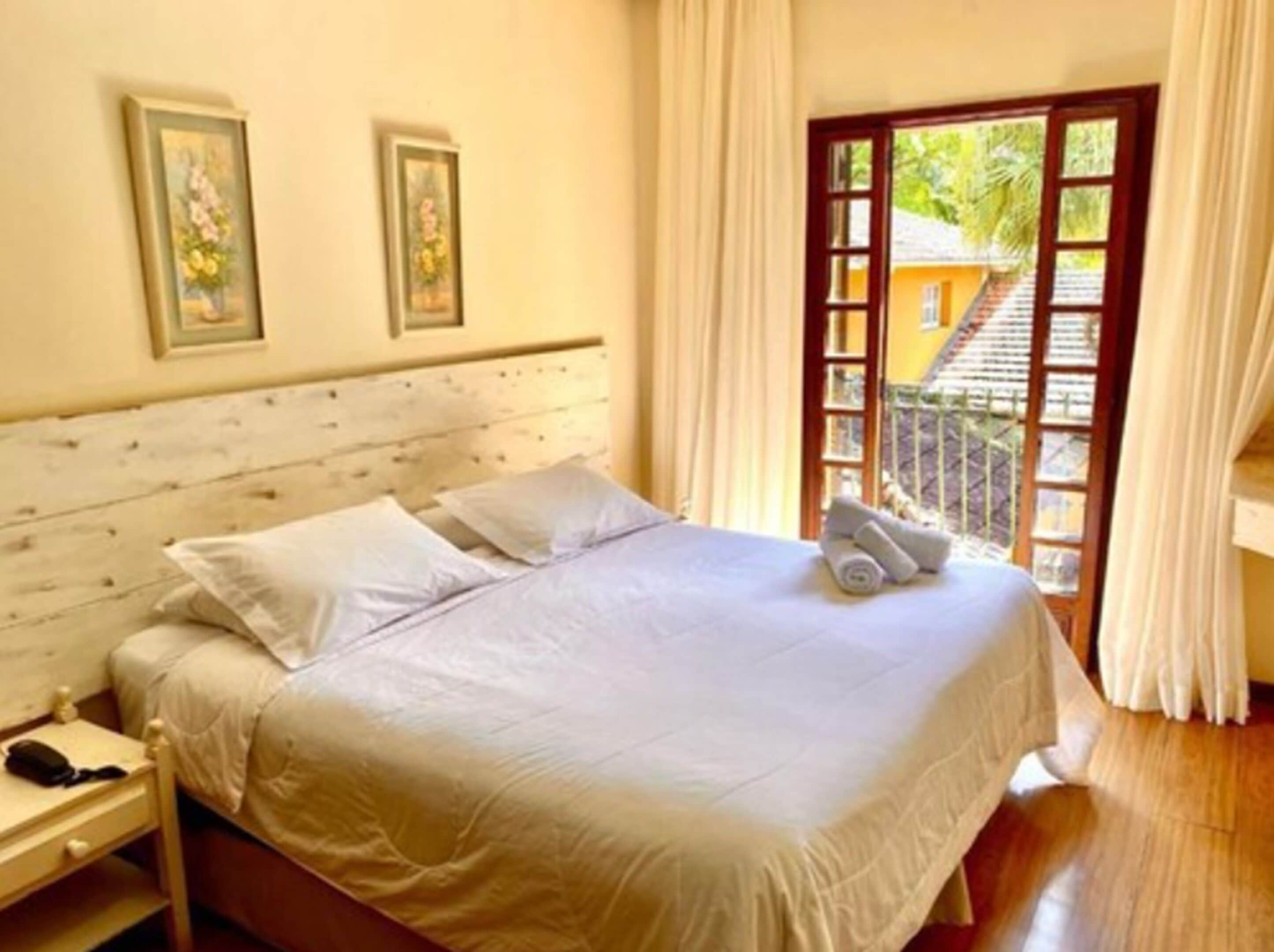 Standard Double Room, Balcony | Minibar, blackout drapes, iron/ironing board, free WiFi