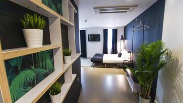 Suite familiar | Tabla de planchar con plancha, wifi gratis y ropa de cama