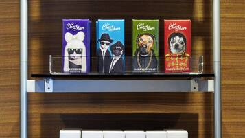 A snack display with various chocolate and snack packages.