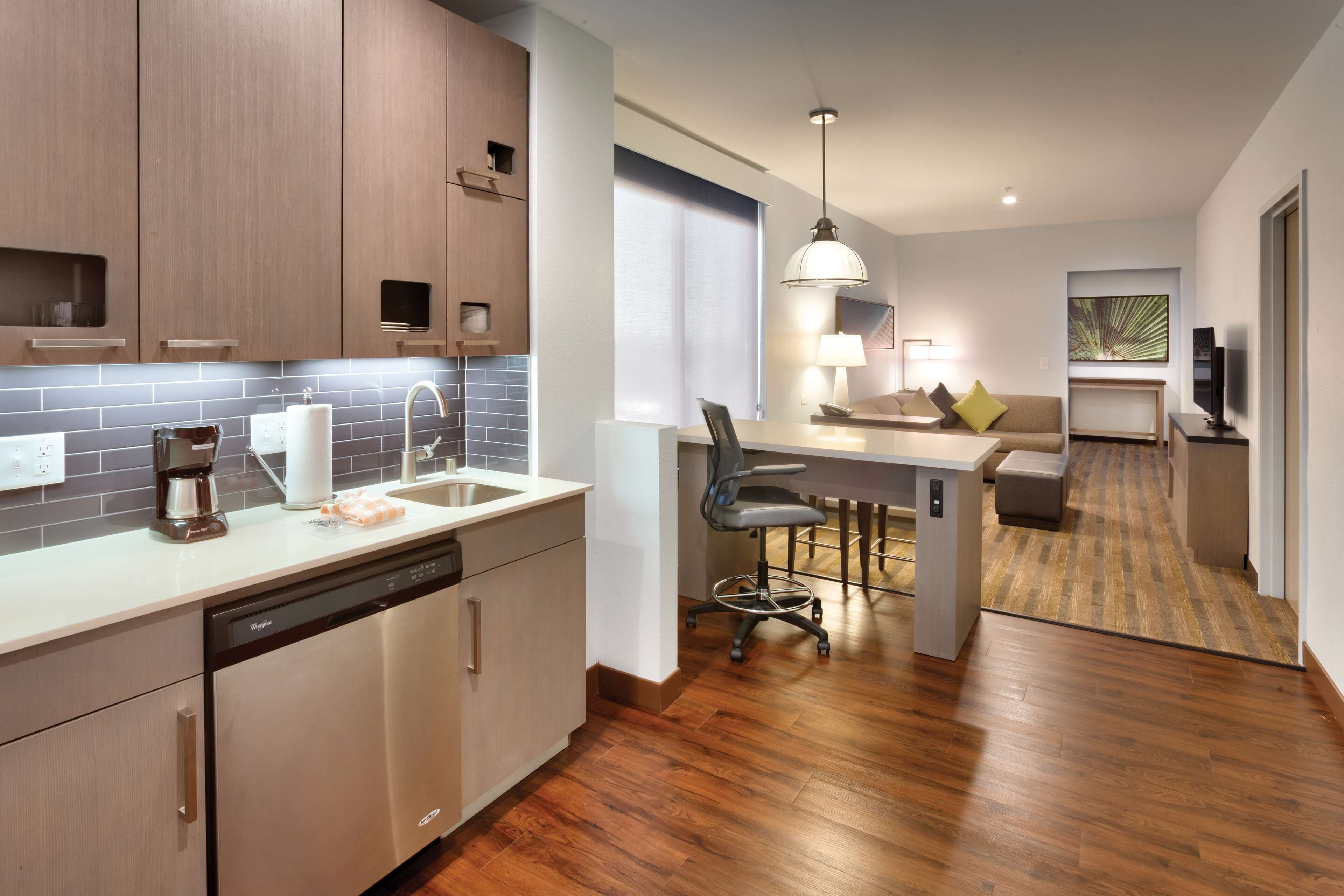 suite, corner (2 grand queen beds and 1 sofa bed) | in-room safe, desk, blackout curtains, iron/ironing board