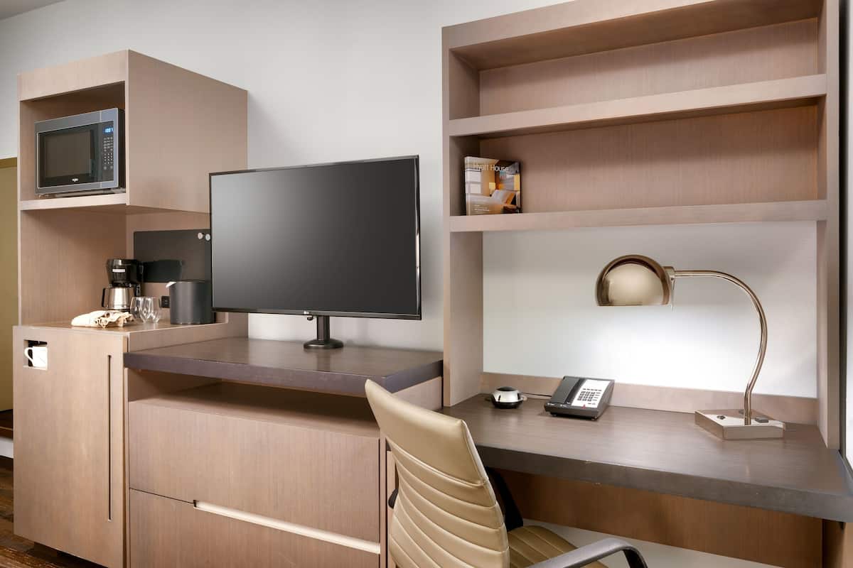 in-room safe, desk, blackout curtains, iron/ironing board