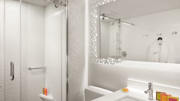 Designer toiletries, hair dryer, bathrobes, slippers