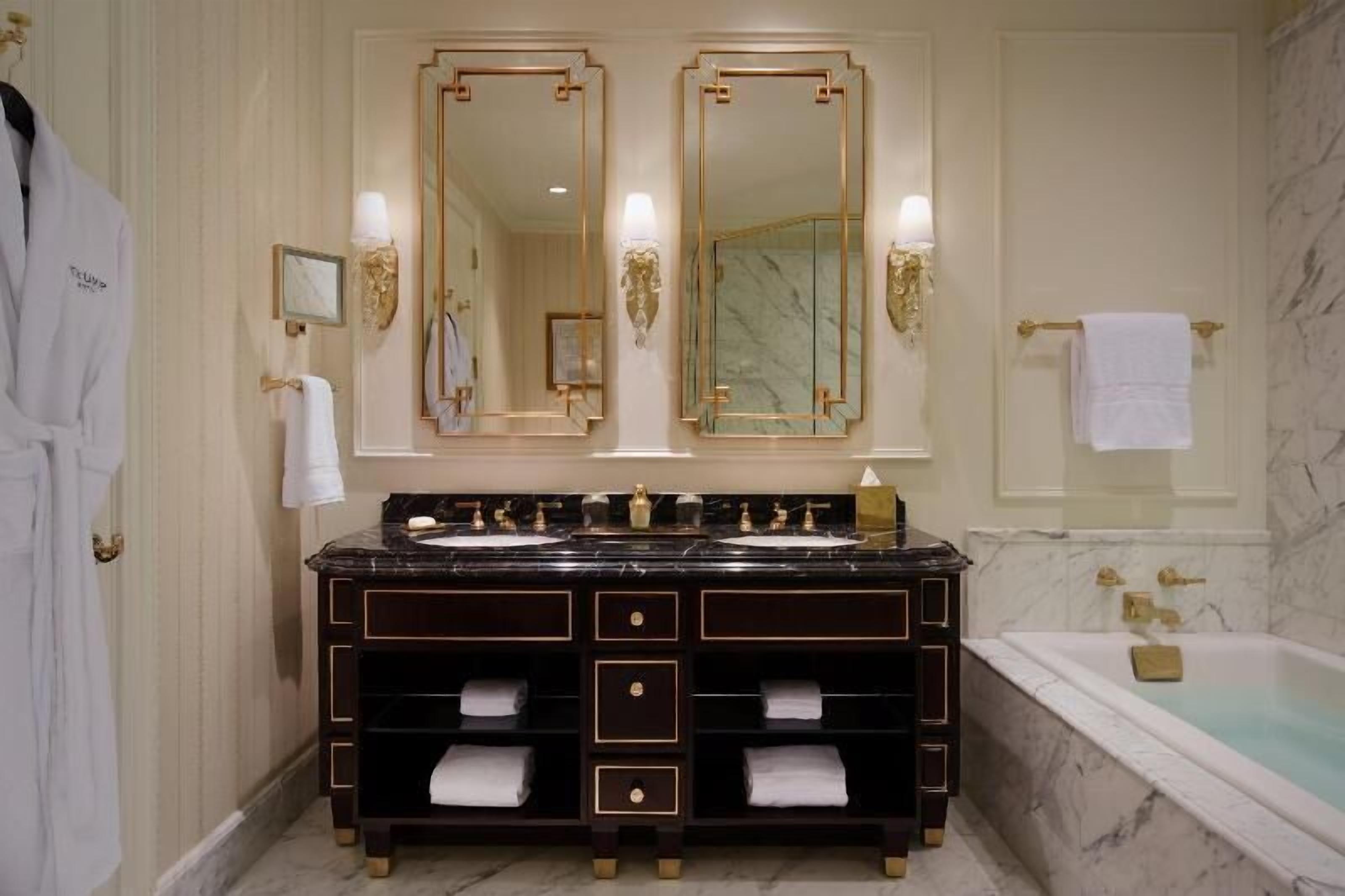 Bathroom | Deep soaking tub, free toiletries, hair dryer, bathrobes