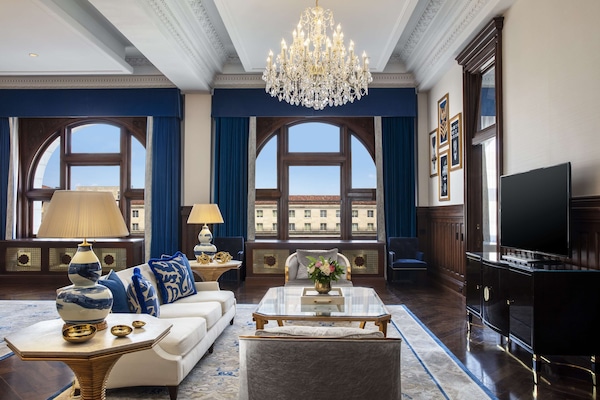 Presidential Suite, 1 Bedroom | Living area | 55-inch flat-screen TV with cable channels, TV, pay films