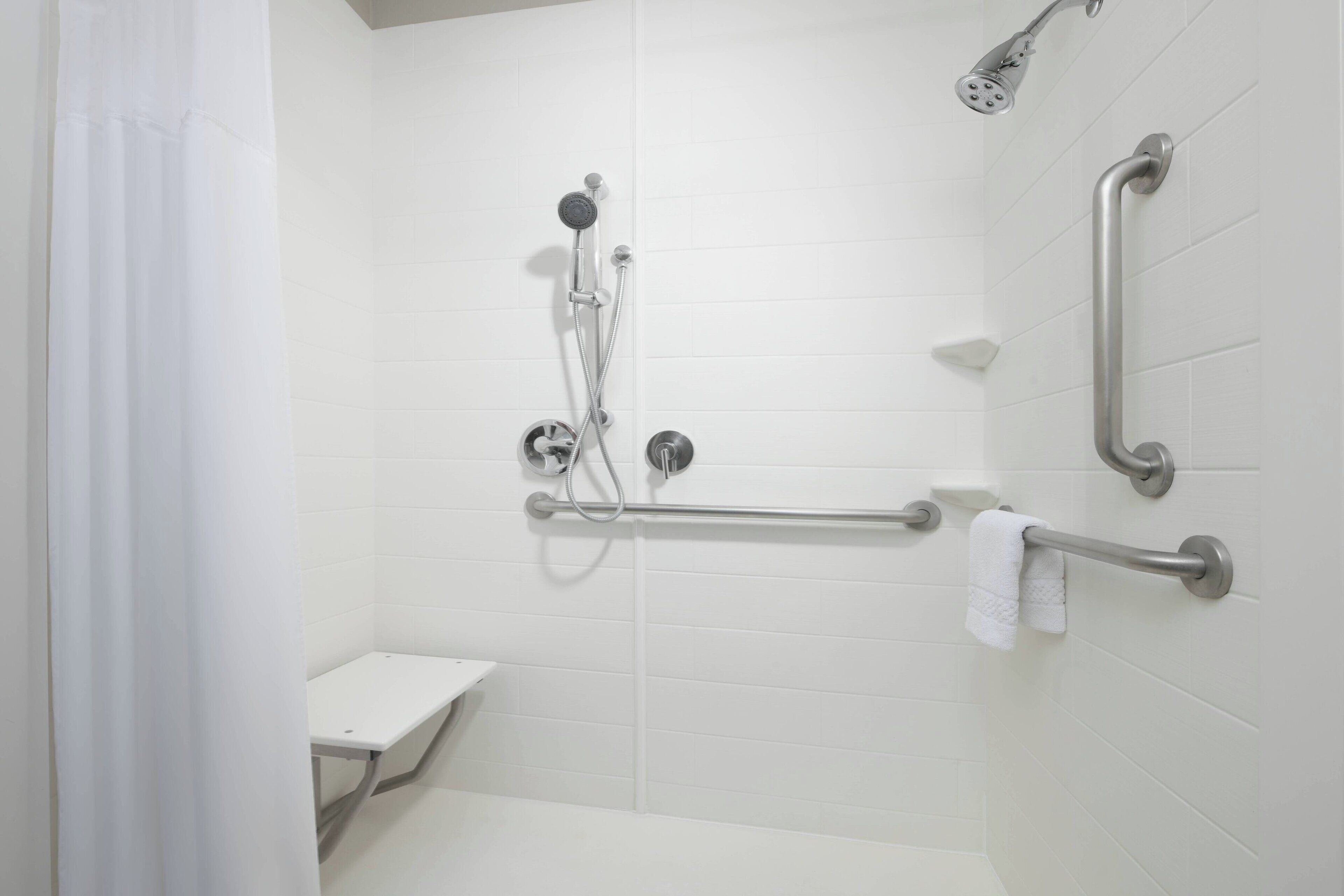 studio, 2 queen beds, trundle bed | bathroom | hydromassage showerhead, free toiletries, hair dryer, towels