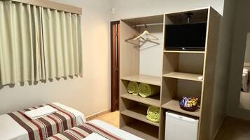 Quádruplo Família | Frigobar, cortinas blackout, berços grátis, Wi-Fi de cortesia