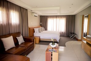 Luxury Suite | 1 bedroom, premium bedding, minibar, in-room safe