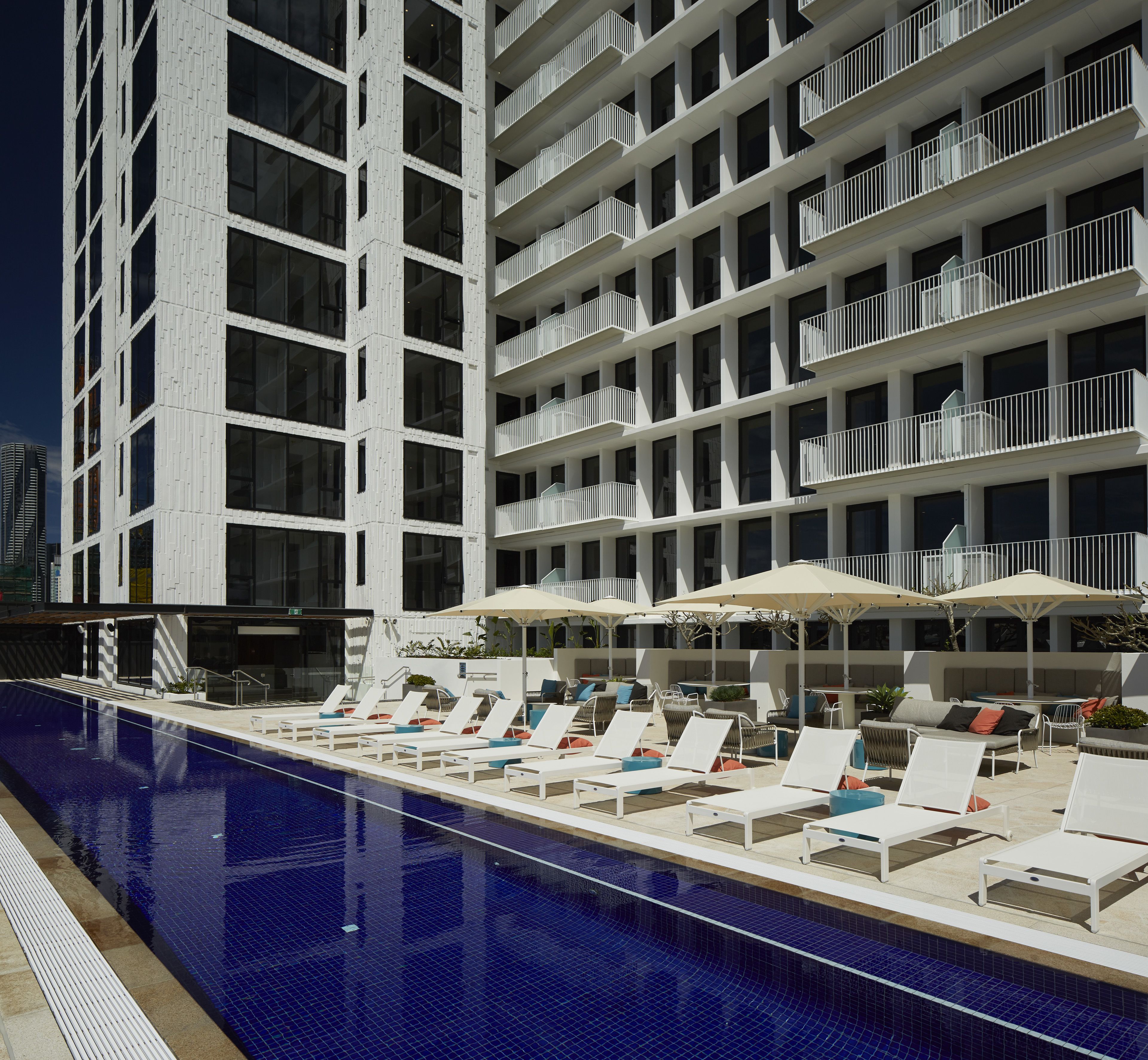 outdoor pool, pool umbrellas, pool loungers