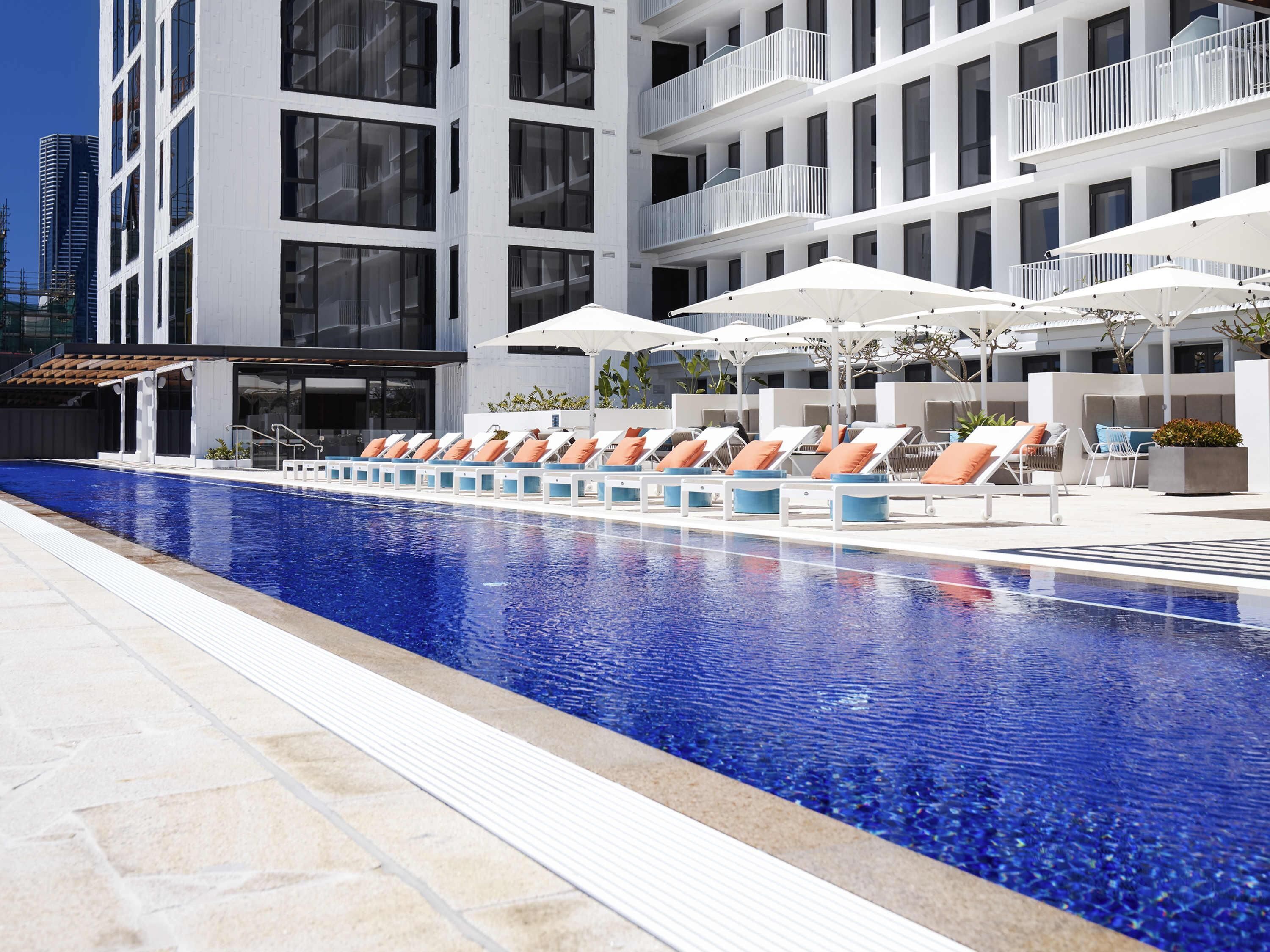 Outdoor pool, pool umbrellas, sun loungers