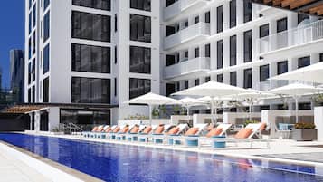 Outdoor pool, pool umbrellas, pool loungers