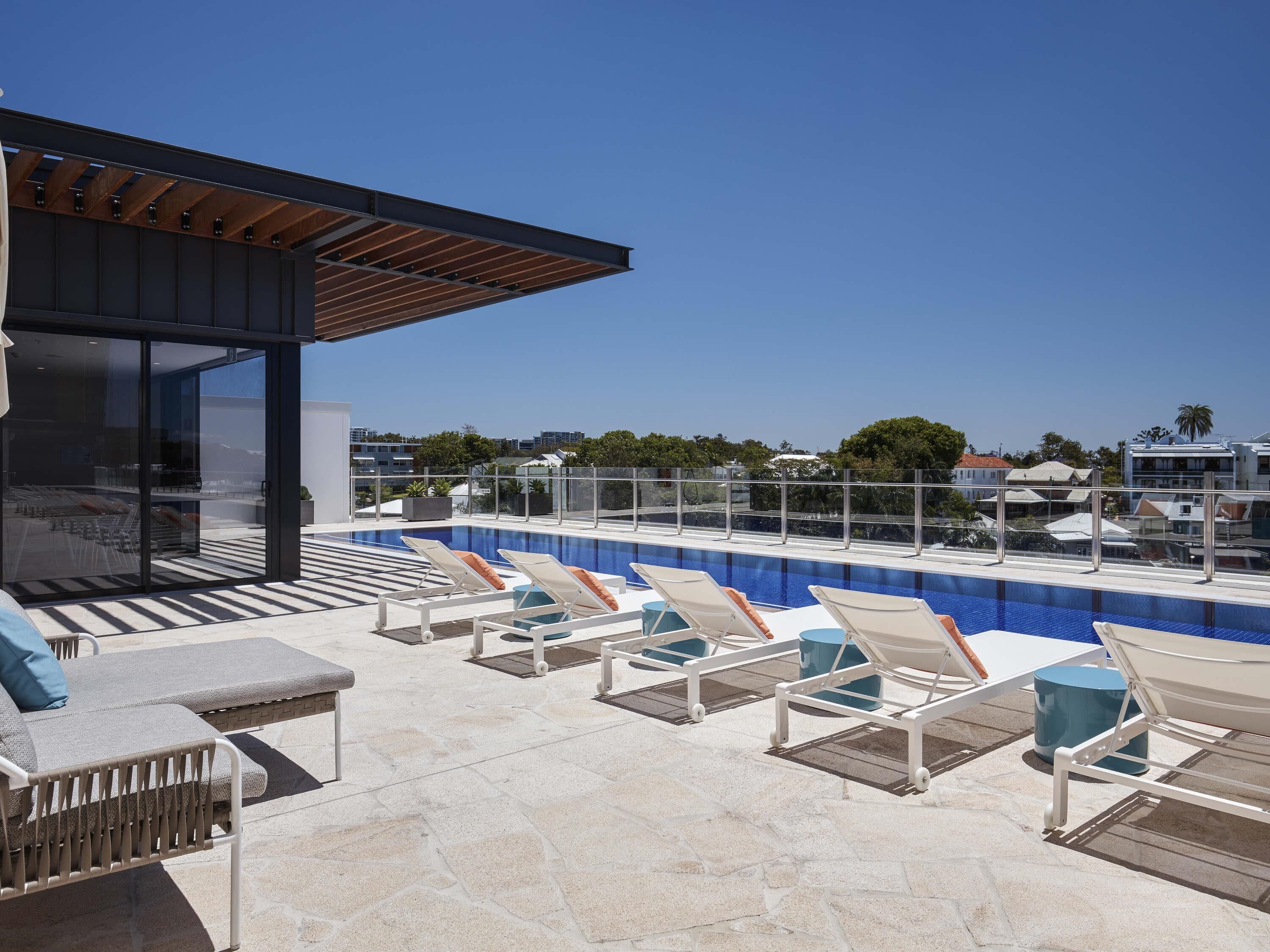 Outdoor pool, pool umbrellas, sun loungers