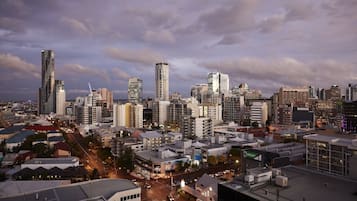 A cityscape with a variety of high-rise buildings, a mix of commercial and residential structures, and a network of roads.