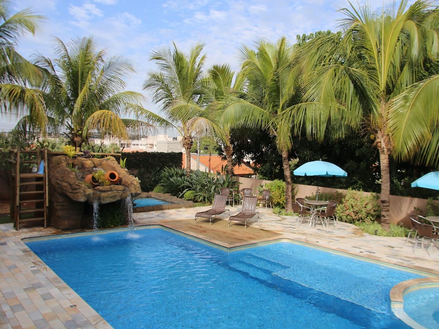 Outdoor pool, open 9:00 AM to 9:00 PM, pool umbrellas, sun loungers