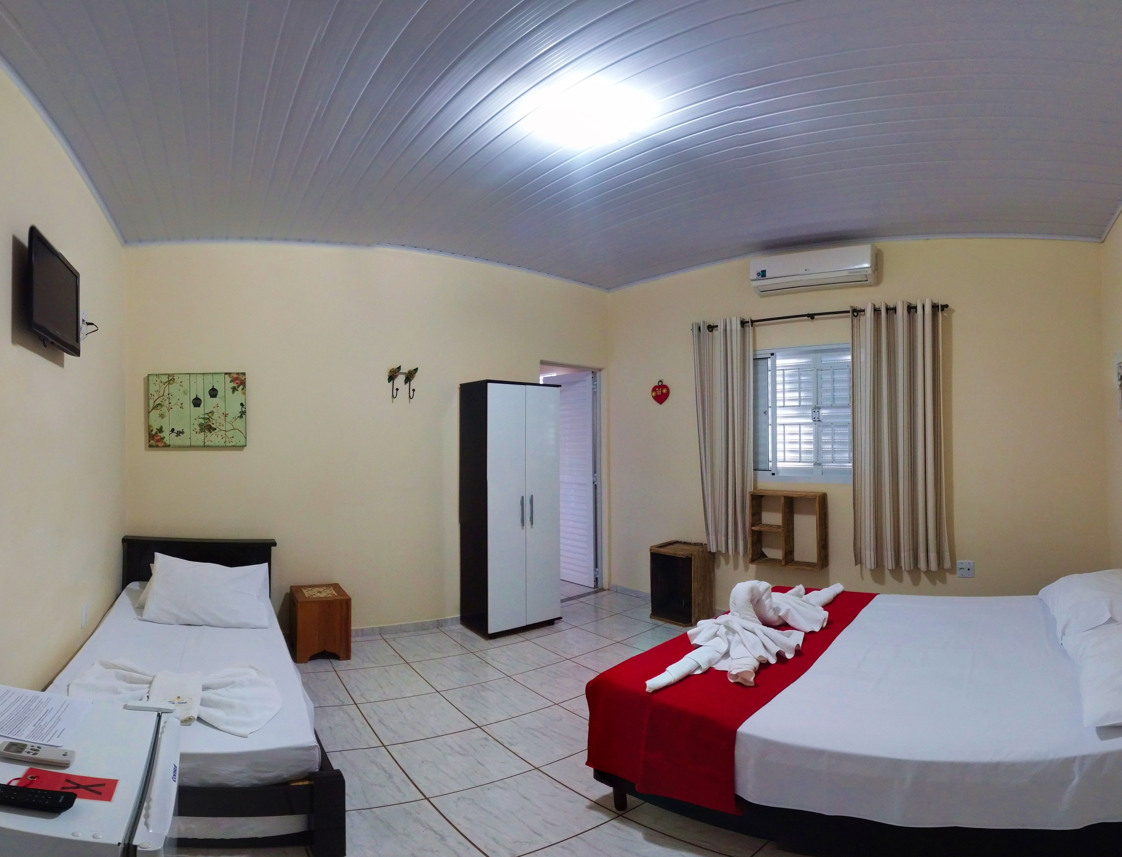 Roupas de cama premium, frigobar, individualmente decorados