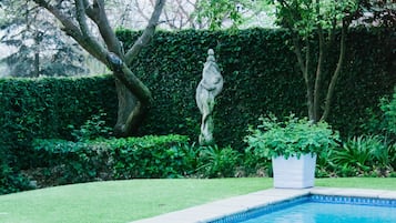 Outdoor pool, pool umbrellas, sun loungers